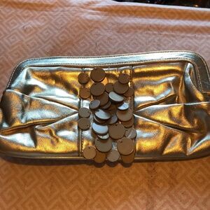 Funky gold Rinaldi clutch, snap shit, clean inside, great for graduation